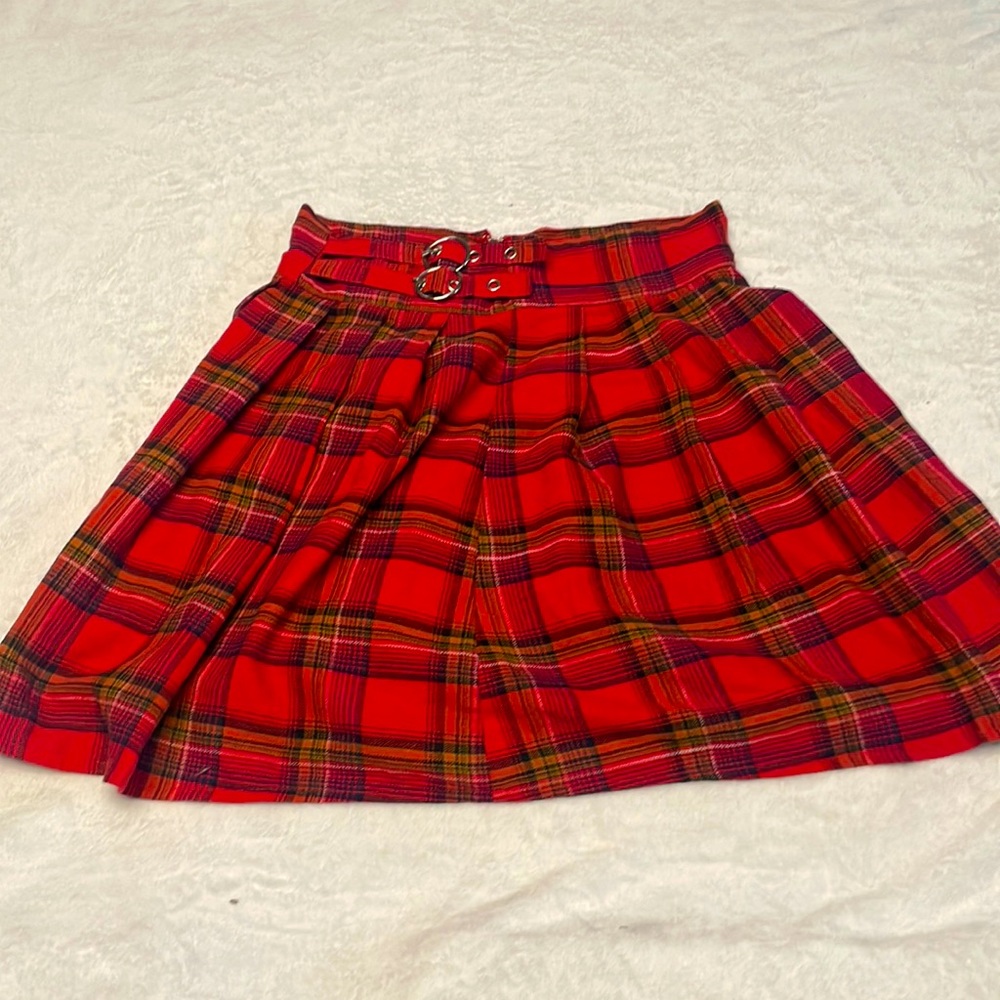 Small plaid red and black skirt with belt detail